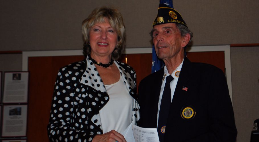 2012 V&C Gene Plocki presents a check on behalf of Twin Cities Post 313